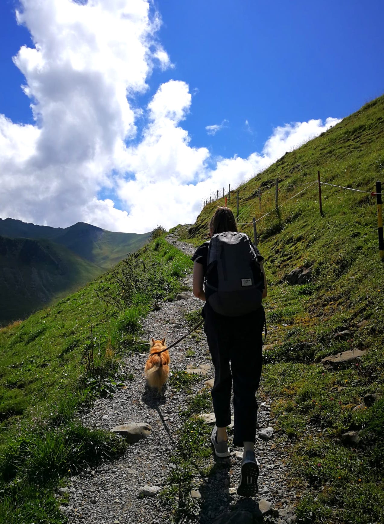 Lina and her dog in the mountains